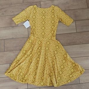 LuLaRoe Dresses - Lularoe yellow patterned Nicole dress size small LuLaRoe Dresses - Lularoe yellow patterned Nicole dress size small